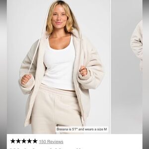 Comfrt awaited hoodie  

Cream Hooded Zip-Up Jacket